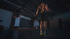 Muscle Department Website Video featuring a male athlete skipping and a female affiliate influencer working out in a premium setting.